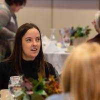 people talking at luncheon table photo 2